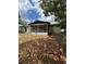 Backyard featuring a screened-in porch and a chain-link fence at 333 Marion Oaks Dr, Ocala, FL 34473