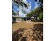 Spacious backyard featuring a screened-in porch on a one-story home at 333 Marion Oaks Dr, Ocala, FL 34473