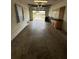 Spacious garage with open door, workbench and pegboard for storage at 333 Marion Oaks Dr, Ocala, FL 34473