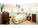 Bright bedroom with natural light, ceiling fan, and comfortable decor at 390 Sw Shorewood Dr, Dunnellon, FL 34431