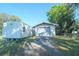 Exterior shot of a storage shed with an attached garage at 390 Sw Shorewood Dr, Dunnellon, FL 34431