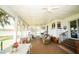 Covered porch with ample natural light and great lake views at 390 Sw Shorewood Dr, Dunnellon, FL 34431