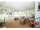 Spacious porch with seating, a swing and panoramic views at 390 Sw Shorewood Dr, Dunnellon, FL 34431