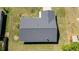 This aerial shot displays the layout of the house, roof, lawn, and surrounding neighborhood at 4541 Sw 44Th Ln, Ocala, FL 34474