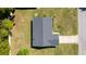 Aerial view of home featuring roof, driveway, and yard at 4541 Sw 44Th Ln, Ocala, FL 34474