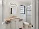 Traditional renovated bathroom with white cabinets and tiled walk-in shower at 4541 Sw 44Th Ln, Ocala, FL 34474