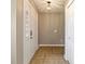 Entryway features tile flooring, front door with sidelight, and overhead lighting at 4541 Sw 44Th Ln, Ocala, FL 34474