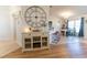 Open-concept design featuring a dining area with stylish decor and a view to the kitchen at 5001 Sw 91St Pl, Ocala, FL 34476