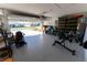 Spacious garage with epoxy flooring provides ample storage and houses various equipment at 5001 Sw 91St Pl, Ocala, FL 34476