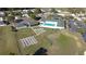 Extensive community facilities, showcasing the pool, shuffleboard, tennis courts, and gathering areas at 5291 Nw 20 Pl, Ocala, FL 34482