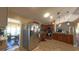 Modern kitchen offers stainless steel appliances and breakfast bar seating at 5291 Nw 20 Pl, Ocala, FL 34482