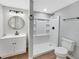 Bathroom featuring a walk-in shower, white vanity, and modern fixtures at 5311 Nw 27Th Ave, Ocala, FL 34475