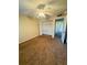 Cozy bedroom featuring carpet flooring and a closet with bi-fold doors at 584 Bahia Cir # B, Ocala, FL 34472