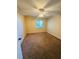 Bright bedroom featuring neutral walls, carpet flooring, a ceiling fan, and a window with natural light at 584 Bahia Cir # B, Ocala, FL 34472
