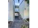 Exterior view of building entrance featuring a stairwell leading to the units on the second floor at 584 Bahia Cir # B, Ocala, FL 34472