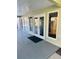 Exterior view of the pool office featuring a glass entry door, window, and signage at 584 Bahia Cir # B, Ocala, FL 34472