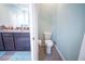 Bathroom featuring a tiled floor and a toilet with a dual-flush system at 6138 Sw 89Th Lane Rd, Ocala, FL 34476