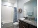 Bathroom featuring a tub and shower combo, toilet, and vanity with a granite countertop at 6138 Sw 89Th Lane Rd, Ocala, FL 34476