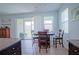 Cozy dining area with sliding doors to patio and backyard at 6138 Sw 89Th Lane Rd, Ocala, FL 34476