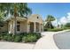Clubhouse exterior featuring lush landscaping, architectural details, and a welcoming entrance at 6138 Sw 89Th Lane Rd, Ocala, FL 34476