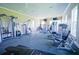 Well-equipped gym with various weight machines, cardio equipment, and ample natural light at 6138 Sw 89Th Lane Rd, Ocala, FL 34476