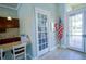 Elegant lobby area featuring a reading room, granite countertop, and American flag at 6138 Sw 89Th Lane Rd, Ocala, FL 34476
