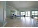 Large, well-lit Lobby area with tables, chairs, and a comfortable seating area at 6138 Sw 89Th Lane Rd, Ocala, FL 34476
