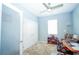 Office space with ceiling fan, natural light, and closet space for storage and organization at 6138 Sw 89Th Lane Rd, Ocala, FL 34476