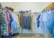 Walk-in closet with shelves, racks, and hanging rods providing ample storage at 6138 Sw 89Th Lane Rd, Ocala, FL 34476