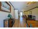 Open living room with wood floors, comfortable seating, and dining area provides a relaxing space at 6398 Sw 108Th St, Ocala, FL 34476