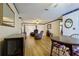 Open-concept living and dining area features hardwood floors and ample natural light at 6398 Sw 108Th St, Ocala, FL 34476