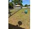 Fenced-in backyard with a metal carport and well at 6725 Nw 14Th Ave, Ocala, FL 34475