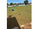 Large back yard featuring a well and chain link fence at 6725 Nw 14Th Ave, Ocala, FL 34475