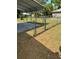 View of fenced yard with a metal carport providing covered parking at 6725 Nw 14Th Ave, Ocala, FL 34475
