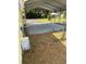 View of the carport and fenced yard at 6725 Nw 14Th Ave, Ocala, FL 34475