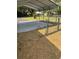 View of the carport and fenced yard at 6725 Nw 14Th Ave, Ocala, FL 34475