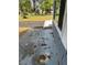 Exterior view showing stone siding, window trim and adjacent walkway at 6725 Nw 14Th Ave, Ocala, FL 34475