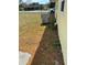 View of the home's air conditioning unit and its placement along the side of the home at 6725 Nw 14Th Ave, Ocala, FL 34475