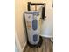 Kenmore power miser water heater in utility area, ready to supply hot water at 6725 Nw 14Th Ave, Ocala, FL 34475
