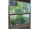 Window view offering pleasant outdoor scenery, enhancing the home's appeal at 6725 Nw 14Th Ave, Ocala, FL 34475