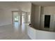 Spacious, light-filled living room with ceramic tile floors, freshly painted walls, and lots of natural light at 71 Nw 42Nd Pl, Ocala, FL 34475