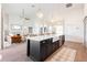 Bright open kitchen features a large island, stainless appliances, and a seamless flow to the living space at 8214 Nw 17Th Cir, Ocala, FL 34475