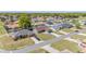 Aerial view of a residential neighborhood with single-Gathering homes and well-maintained lawns at 8216 Sw 60Th Ter, Ocala, FL 34476