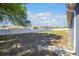 Spacious backyard with a well-maintained lawn and a white fence, perfect for outdoor activities at 8216 Sw 60Th Ter, Ocala, FL 34476