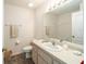 Simple bathroom offering a clean vanity, neutral colors, and ample counter space at 8216 Sw 60Th Ter, Ocala, FL 34476