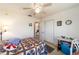 Cozy bedroom with ceiling fan and ample natural light at 8216 Sw 60Th Ter, Ocala, FL 34476
