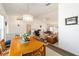 Open-concept dining area with views of the living room at 8216 Sw 60Th Ter, Ocala, FL 34476