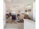Bright and spacious living room featuring vaulted ceilings, comfortable seating, and a neutral color palette at 8216 Sw 60Th Ter, Ocala, FL 34476