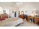 Spacious main bedroom featuring a walk-in closet and ensuite bathroom at 8216 Sw 60Th Ter, Ocala, FL 34476