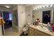 Functional bathroom featuring a sink, toilet, and a tub with a shower at 8386 Sw 136Th Pl, Ocala, FL 34473